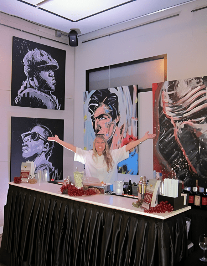 Woman standing behind a decorated bar counter.